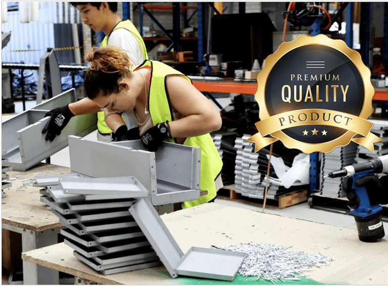 female factory worker assembling steel parts